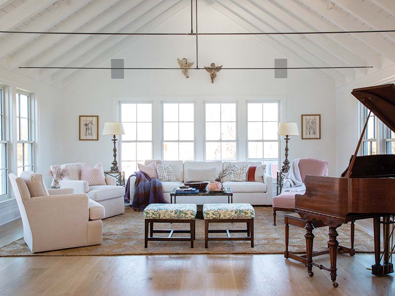 The light-drenched sunroom—which feels like an easy extension of the home—is a natural gathering spot.