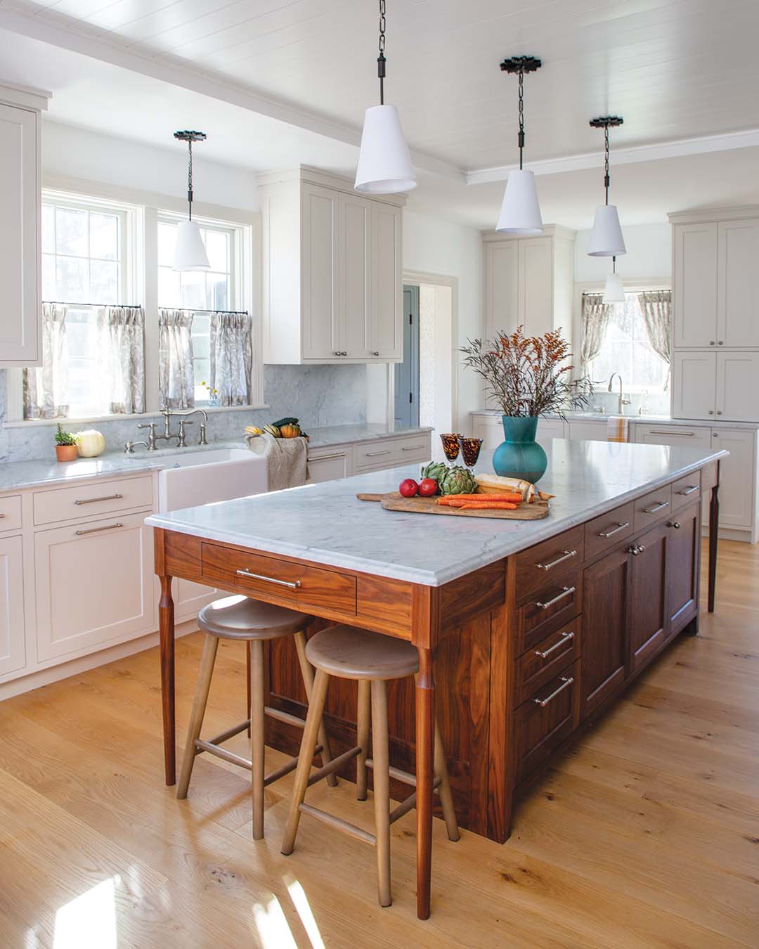 Nicole adds that her favorite feature is its black walnut island. “We had legs turned for each of the corners, so it’s like a piece of furniture. Plus,” she says, “it’s fully functional and has an abundance of storage.”