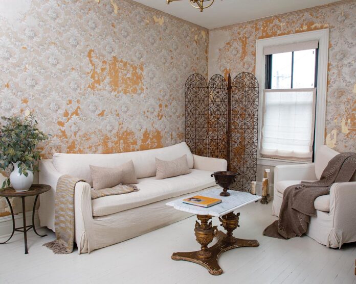 A shining example of Anthony’s ability to both update and honor the property’s past, the original wallpaper that was uncovered in the revamp was the inspiration for the overall design. “When we were renovating, we saw a little bit peeping through,” Anthony says, noting that, as they continued to uncover it, they realized it was in better shape than expected. For the areas that couldn’t be saved, he used a Venetian plaster to create a patchwork effect, and a layer of beige paper was left in spots as well, creating what Anthony describes as a “soulful backdrop that feels really unique.”