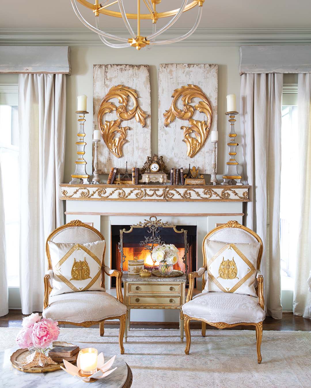 Now unarguably the focal point of the room, the fireplace, once a concrete slab, was built out and adorned with an antique cornice board that caught Melissa’s eye at Maison de France Antiques in Leeds, Alabama, and just happened to measure out to the perfect size.