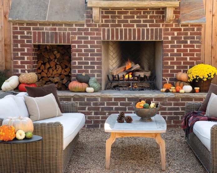 Come autumn, nothing beats the comfy living area outfitted with both a brick wood-burning fireplace and TV, making it the ideal hangout for football games.