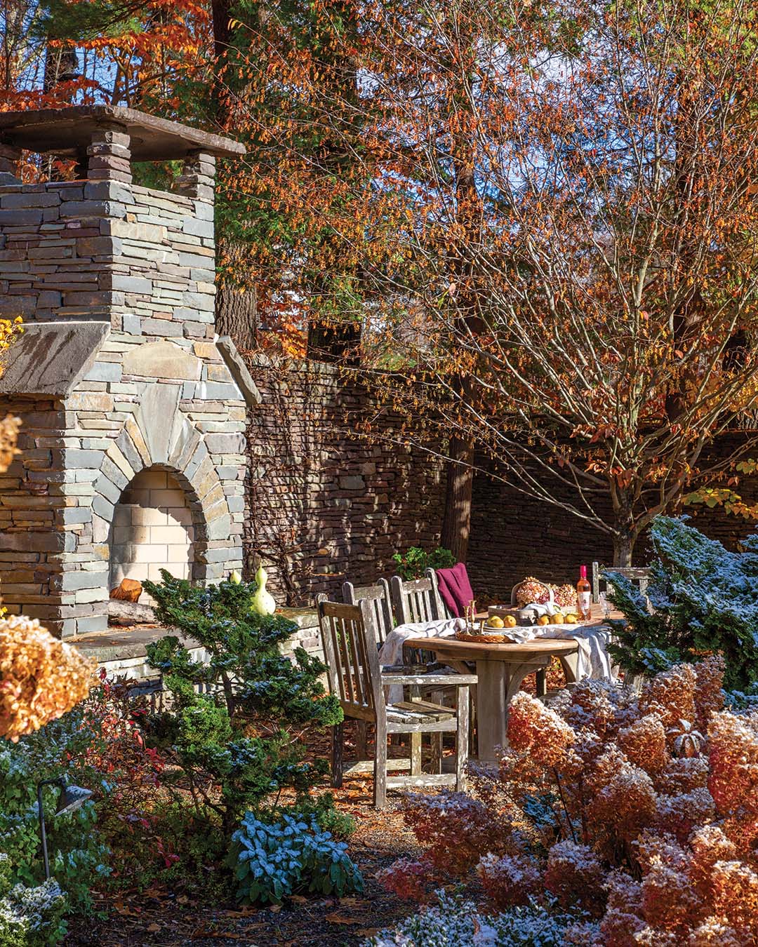 The dining area offers moonlit views of the pines to the cottage terrace looking out over the Catskills.