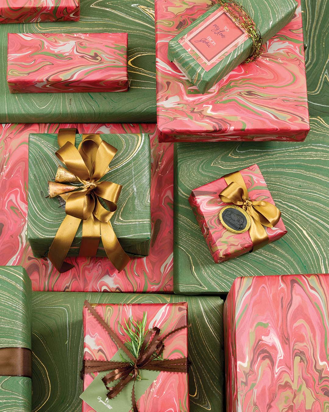 Green wrapping paper and gold ribbon from Paper Source. Red wrapping paper from Dogwood Hill. Gift tags from Target. Intaglio from Monahan Papers.