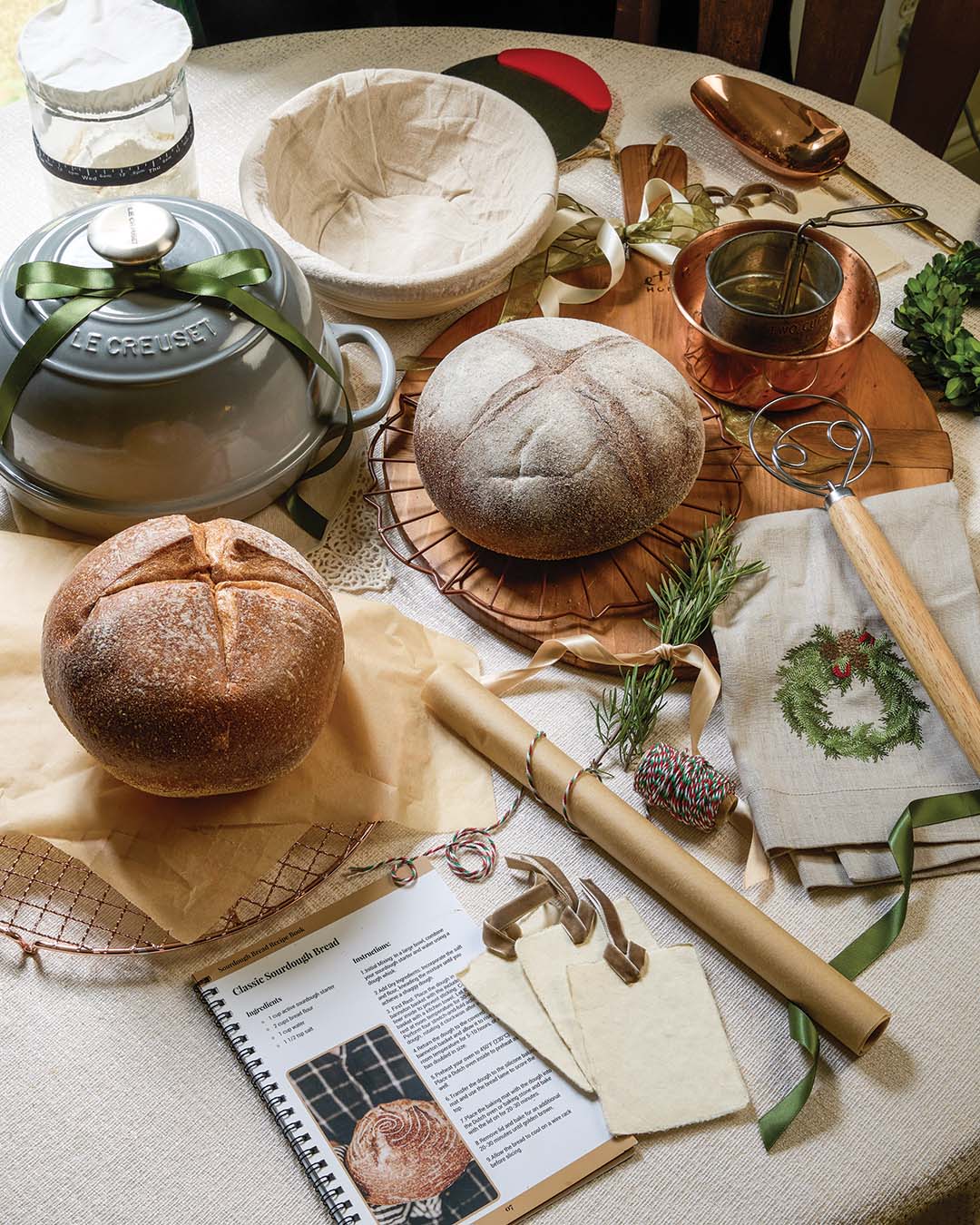 Copper measuring scoop from Galley & Fen. Bread oven from Le Creuset. Sourdough starter kit from BANTBSKT, Amazon. Round cutting board from etúHOME.