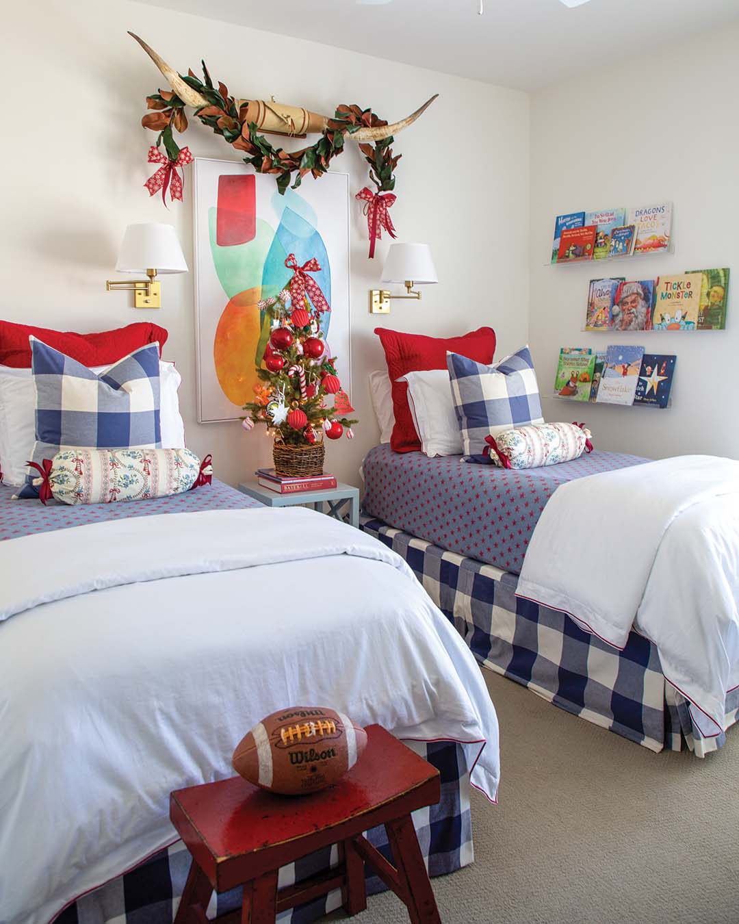 Kate’s youngest son, Mial, is a fan of the color red, which makes an appearance in both the holiday and everyday décor in his room. The set of bull horns are a nod to Hunter’s Texas roots and are accented with a classic magnolia Christmas garland.