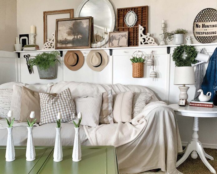 The comfortable living room boasts a newly added board-and-batten wall with peg hooks that not only adds character and charm to the space but a practical element as well. Becca shares that the project was completed by her husband as an early Christmas gift and will provide the perfect place for the family’s stockings. “It’s a much cozier space now for relaxing and having family movie nights,” she adds.